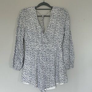 Size large, deep v-neck romper from Altar’d State